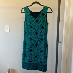Emerald green and navy dress (much brighter green than the photo)